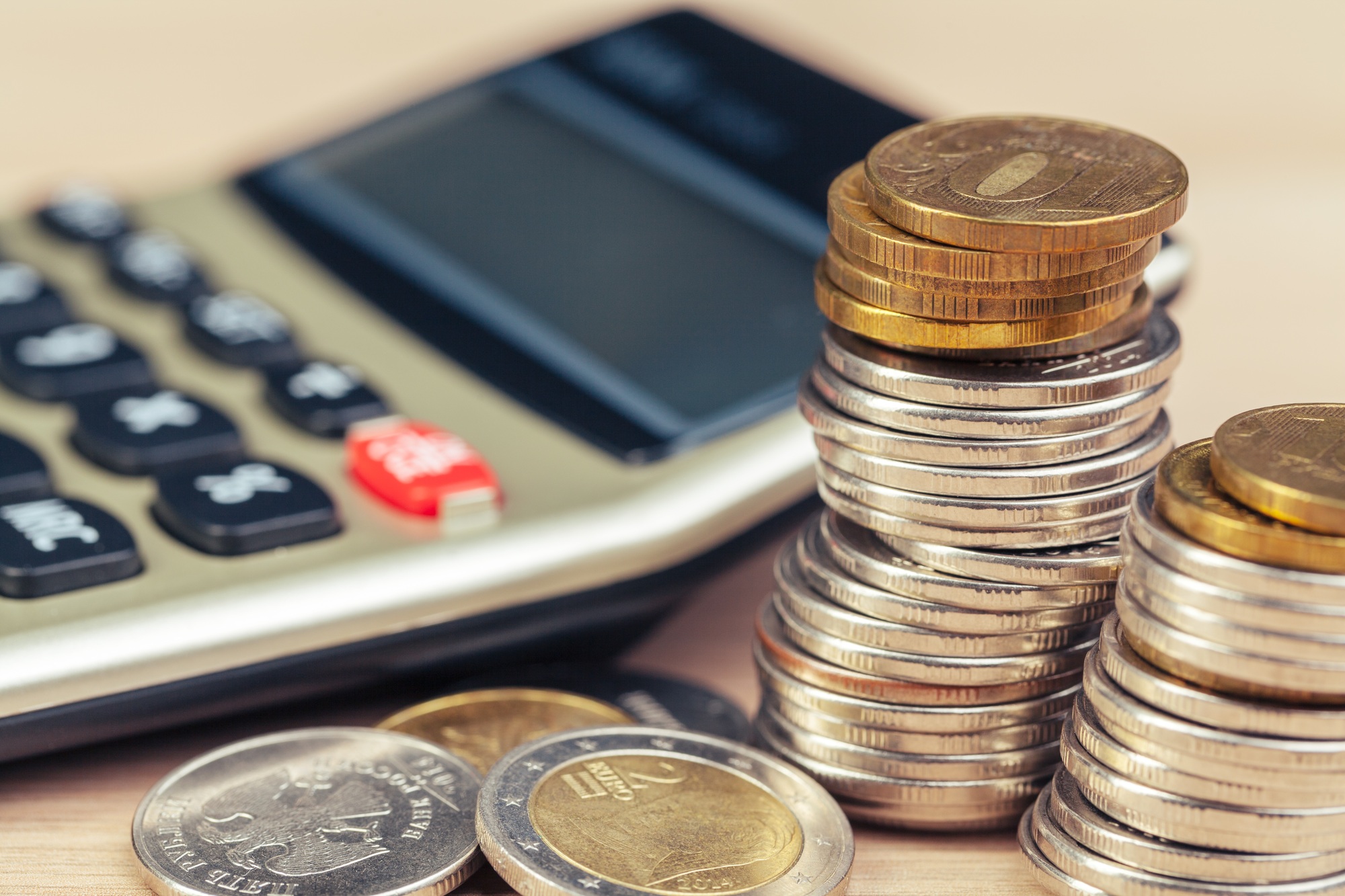 stack of coins and calculator,concept idea for business finance